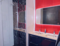 sink, indoor, plumbing fixture, tap, red, countertop, bathtub, shower, kitchen, mirror